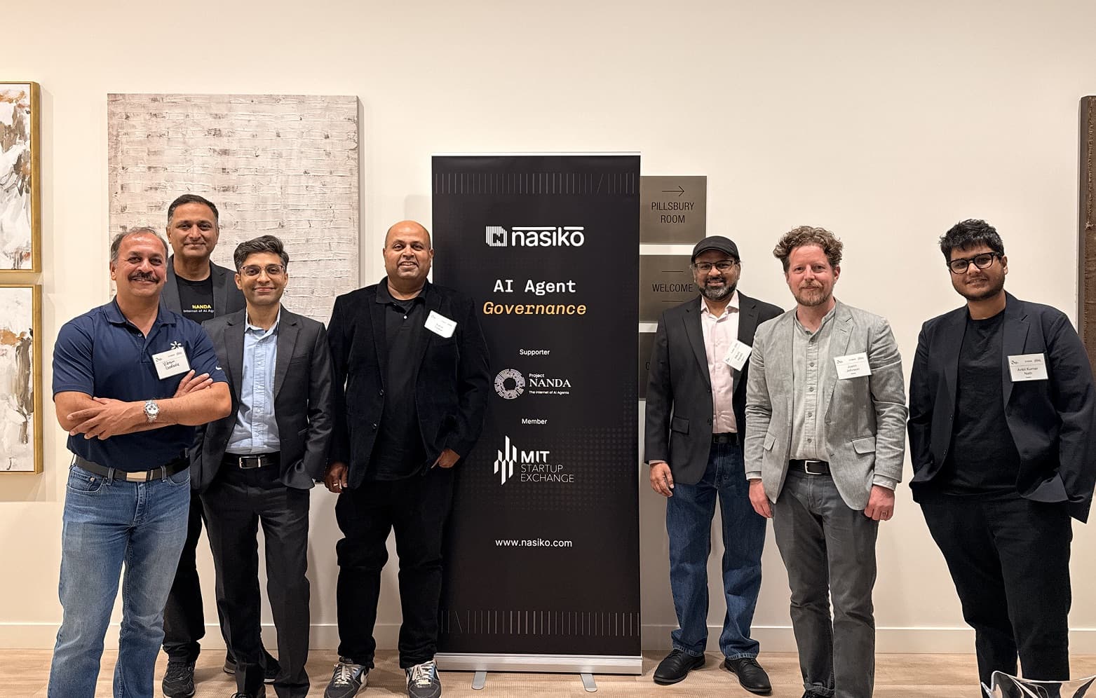 The Nasiko team and partners gathered around the Nasiko AI Agent Governance banner at the Mayfield Portfolio Event.